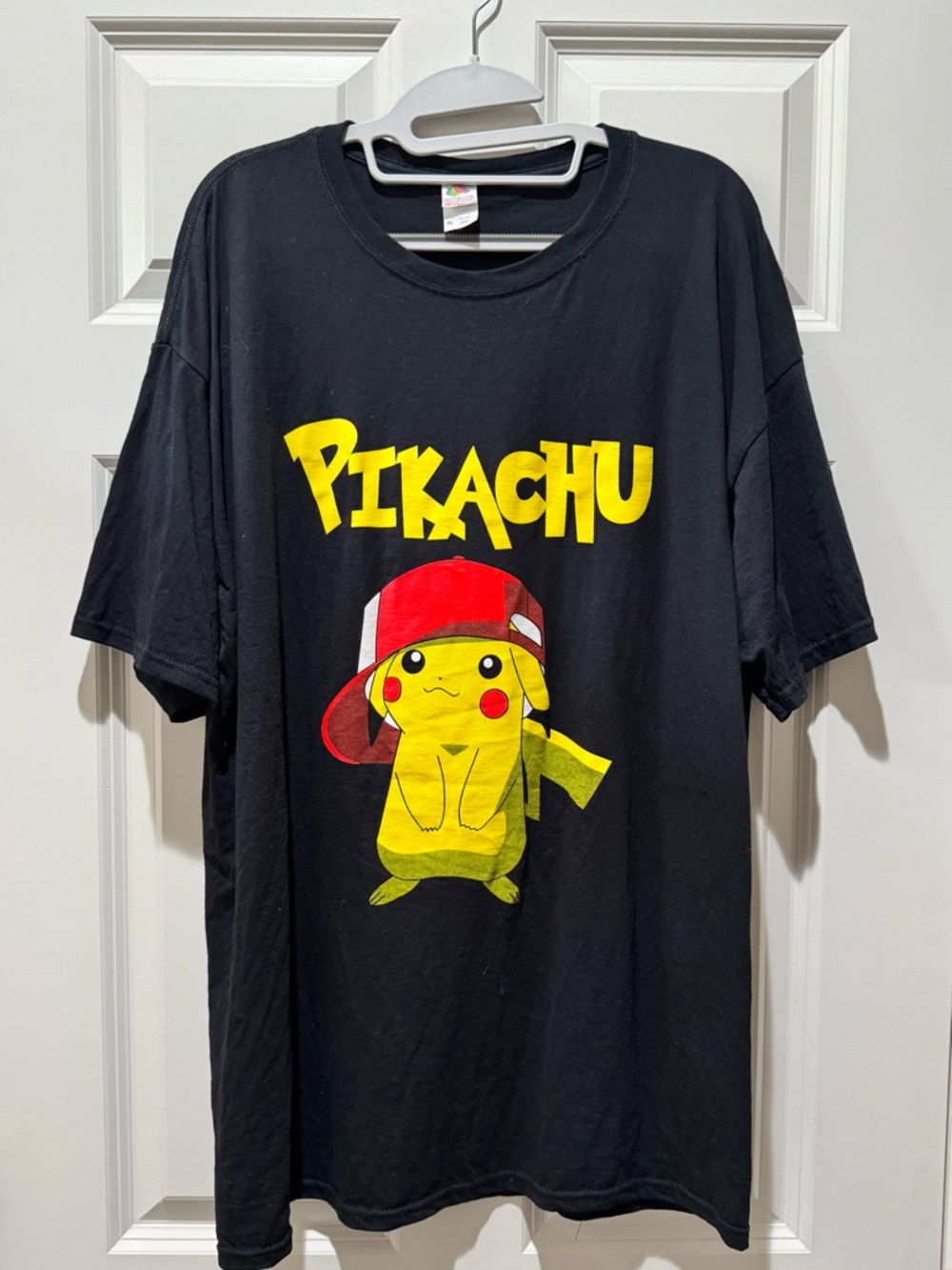 Graphic Pokemon Pikachu t shirt wearing a red hat